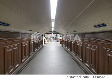 Empty Vintage London Underground Tunnel with Wood Paneling 134856500