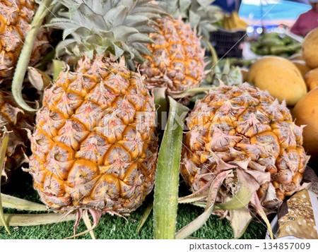 juicy ripe pineapple on the market in Thailand juicy ripe pineapple on the market in Thailand 134857009