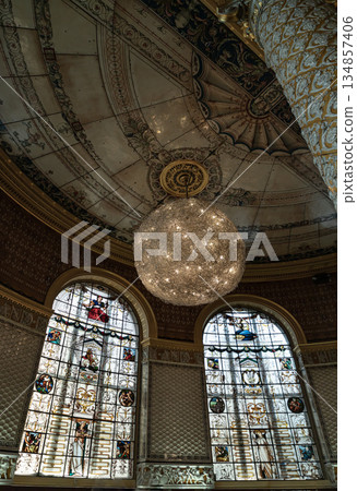 View of The Gamble Room with the walls and large columns were covered in a variety of colourful ceramic tiles, The ceiling was decorated in enamelled iron sheets, Stained-glass windows and pendant View of The Gamble Room with the walls and large columns were covered in a variety of colourful ceramic tiles, The ceiling was decorated in enamelled iron sheets, Stained-glass windows and pendant 134857406