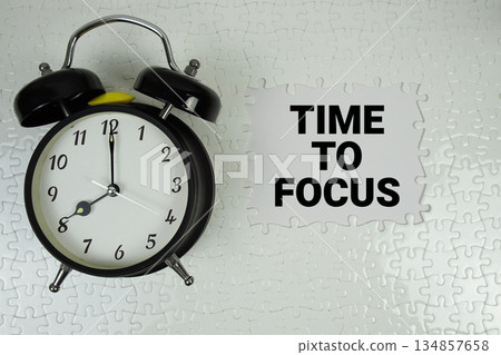 Time To Focus text with alarm clock on white background 134857658