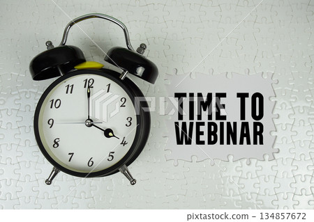 Time to Webinar text with alarm clock on white background 134857672
