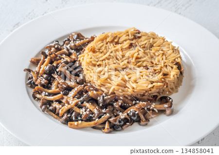 Savory fried rice with umami Shimeji mushrooms Savory fried rice with umami Shimeji mushrooms 134858041