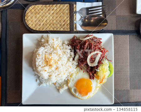 Delicious Corned Beef with Garlic Rice and Fried Egg on Plate Delicious Corned Beef with Garlic Rice and Fried Egg on Plate 134858115