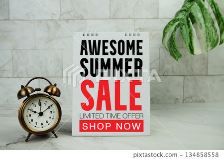 Summer Sale text with alarm clock on marble background 134858558
