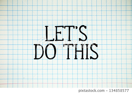 Let's Do This text written on white notebook sheet with grid 134858577