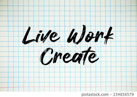 Live Work Create text written on white notebook sheet with grid 134858579
