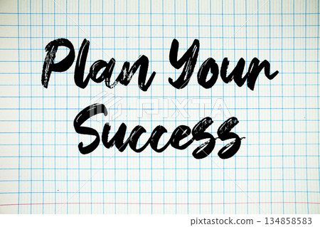 Plan Your Success text written on white notebook sheet with grid Plan Your Success text written on white notebook sheet with grid 134858583