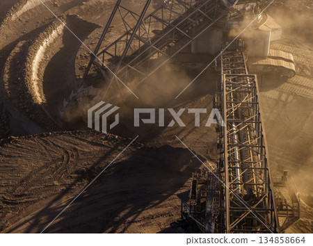 A large bucket wheel excavator in a lignite brown coal mine A large bucket wheel excavator in a lignite brown coal mine 134858664