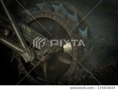 A large bucket wheel excavator in a lignite brown coal mine A large bucket wheel excavator in a lignite brown coal mine 134858684