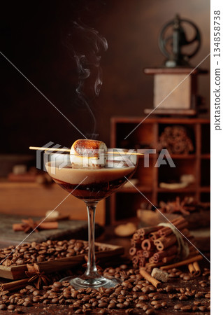 Cream and coffee cocktail, decorated with toasted marshmallow. Cream and coffee cocktail, decorated with toasted marshmallow. 134858738