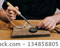 Hands soldering electronic 134858805