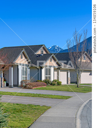 Nice residential houses on bright winter day in British Columbia, Canada Nice residential houses on bright winter day in British Columbia, Canada 134859106