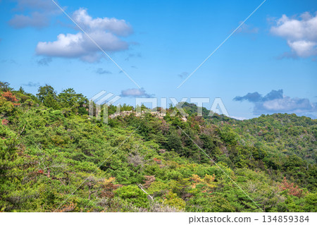 Okayama Kinojo Castle high stone wall distant view Okayama Kinojo Castle high stone wall distant view 134859384