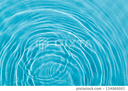 drops on water with circles on a blue background drops on water with circles on a blue background 134860081