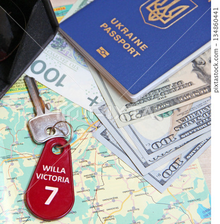 money passport and villa keys. Travel concept. Things collected for travel money passport and villa keys. Travel concept. Things collected for travel 134860441