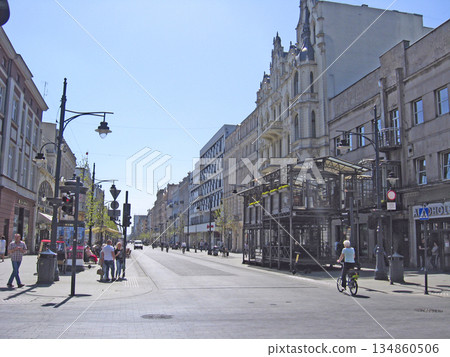 Views of the city of Lodz. Street of the Polish city Lodz during the day Views of the city of Lodz. Street of the Polish city Lodz during the day 134860506