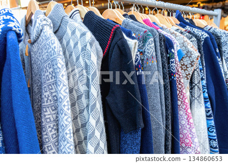 Festive winter fashion on stand for holiday market 134860653