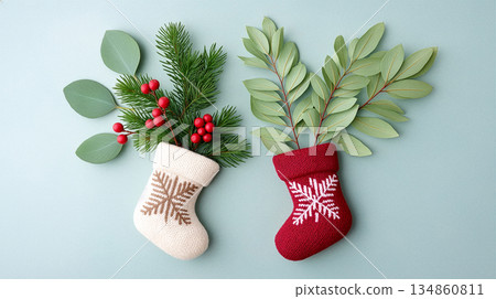 Knit Stockings Decor, Pair Of Handmade Knit Legwear With Eucalyptus And Holly Sprigs On Soothing Teal Backdrop Knit Stockings Decor, Pair Of Handmade Knit Legwear With Eucalyptus And Holly Sprigs On Soothing Teal Backdrop 134860811