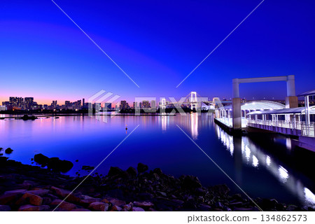 Odaiba Seaside Park: Rainbow Bridge and pier at dusk Odaiba Seaside Park: Rainbow Bridge and pier at dusk 134862573