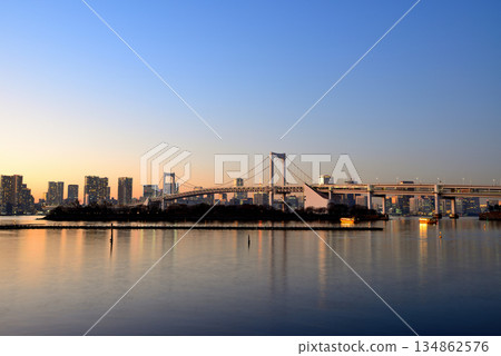 Odaiba Seaside Park: Rainbow Bridge and pier at dusk Odaiba Seaside Park: Rainbow Bridge and pier at dusk 134862576