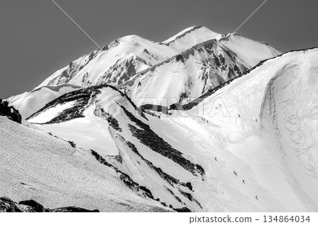 View of Mount Betsuyama's southern peak and Mount Okudainichi. Climbing Mount Tateyama and Mount Betsuyama in the Northern Alps during the remaining snow season. Used for newspaper advertisements. View of Mount Betsuyama's southern peak and Mount Okudainichi. Climbing Mount Tateyama and Mount Betsuyama in the Northern Alps during the remaining snow season. Used for newspaper advertisements. 134864034