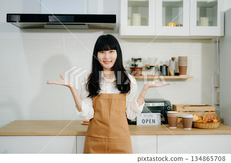 Startup successful small business owner sme woman stand with tablet in cafe restaurant. Startup successful small business owner sme woman stand with tablet in cafe restaurant. 134865708