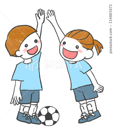Soccer players giving a high five Soccer players giving a high five 134865872