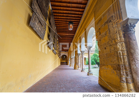 Historic Arched Walkway of Mosque Cathedral of Cordoba in Spain. 134866282