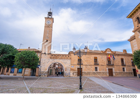 Historic town square with clock tower in Consuegra, Spain. 134866300