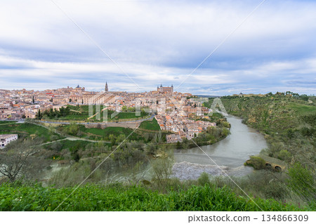 Historic Toledo cityscape at spring dusk with Tagus River, Spain. Historic Toledo cityscape at spring dusk with Tagus River, Spain. 134866309
