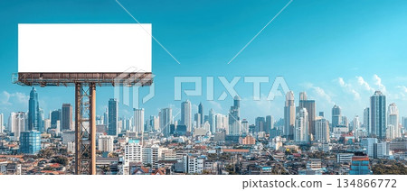 Urban Billboard in Bright Sky Overlooking a Cityscape with Tall Buildings and Modern Architecture Urban Billboard in Bright Sky Overlooking a Cityscape with Tall Buildings and Modern Architecture 134866772