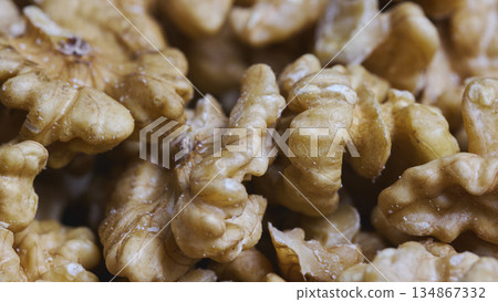 Pile of Shelled Walnuts Texture Macro Background. High quality photo 134867332