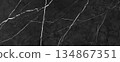 Beautiful black marble ceramic tiles, natural abstract striped pattern on a surface 134867351