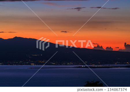 Sunrise sky and clouds floating on the sea Sunrise sky and clouds floating on the sea 134867374