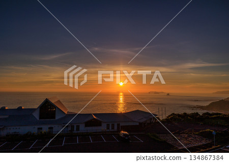 Sunset sky and clouds floating over the sea 134867384