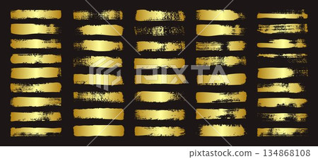 Golden brush strokes, lines, ink smudges, hand-drawn scribble shapes. Handmade sketchy marks, acrylic stains, charcoal streaks. Paint textures, dry brush effect. Marker underline. Vector illustration 134868108