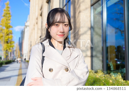 A woman commuting in the office district 134868511