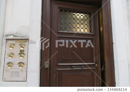 Apartment doorbell button 134869214