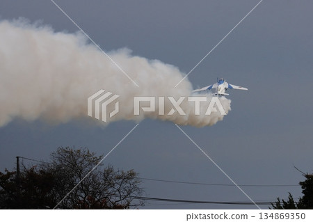 Blue Impulse demonstration flight: Plane No. 5 takes off trailing smoke Blue Impulse demonstration flight: Plane No. 5 takes off trailing smoke 134869350