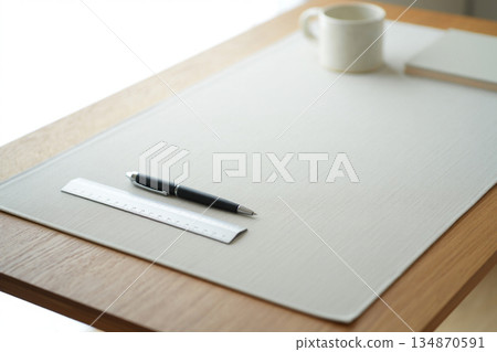 notebook and pen on table 134870591