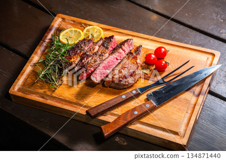 Grill a steak over an outdoor Grill a steak over an outdoor 134871440