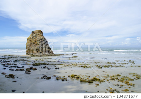 Seastack and shoreline composition with rippled tidal water and bright sky gradients overhead, Kuala Penyu, Sabah, Malaysia. Seastack and shoreline composition with rippled tidal water and bright sky gradients overhead, Kuala Penyu, Sabah, Malaysia. 134871677