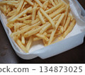A mountain of freshly fried fries 134873025