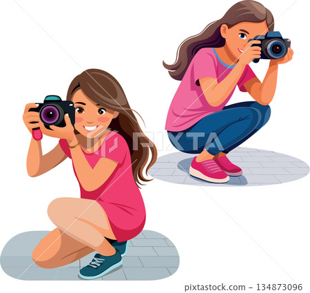 Young woman photographer taking picture crouching on the ground- Young woman photographer taking picture crouching on the ground- 134873096