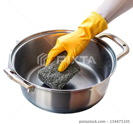 Person wearing yellow rubber gloves cleaning pot with sponge Person wearing yellow rubber gloves cleaning pot with sponge 134873105