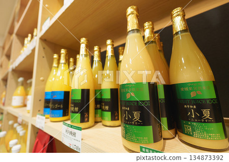 Orange juice displayed on a shelf Orange juice displayed on a shelf 134873392