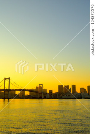 Ariake Kita Greenway Park: Golden Rainbow Bridge at dusk 134873576