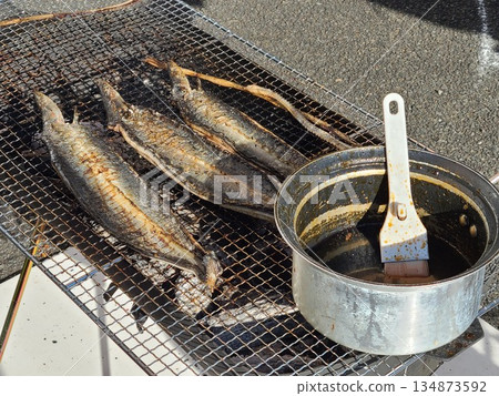 Demonstration and sale of grilled wild eel Demonstration and sale of grilled wild eel 134873592