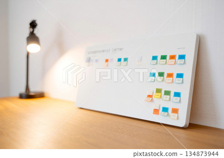 whiteboard on desk in office 134873944