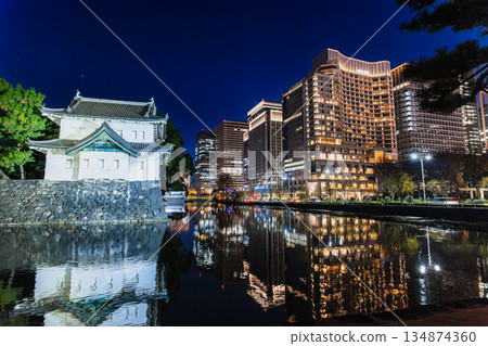 Tokyo: The illuminated Tatsumi Tower of the Imperial Palace and Marunouchi Tokyo: The illuminated Tatsumi Tower of the Imperial Palace and Marunouchi 134874360